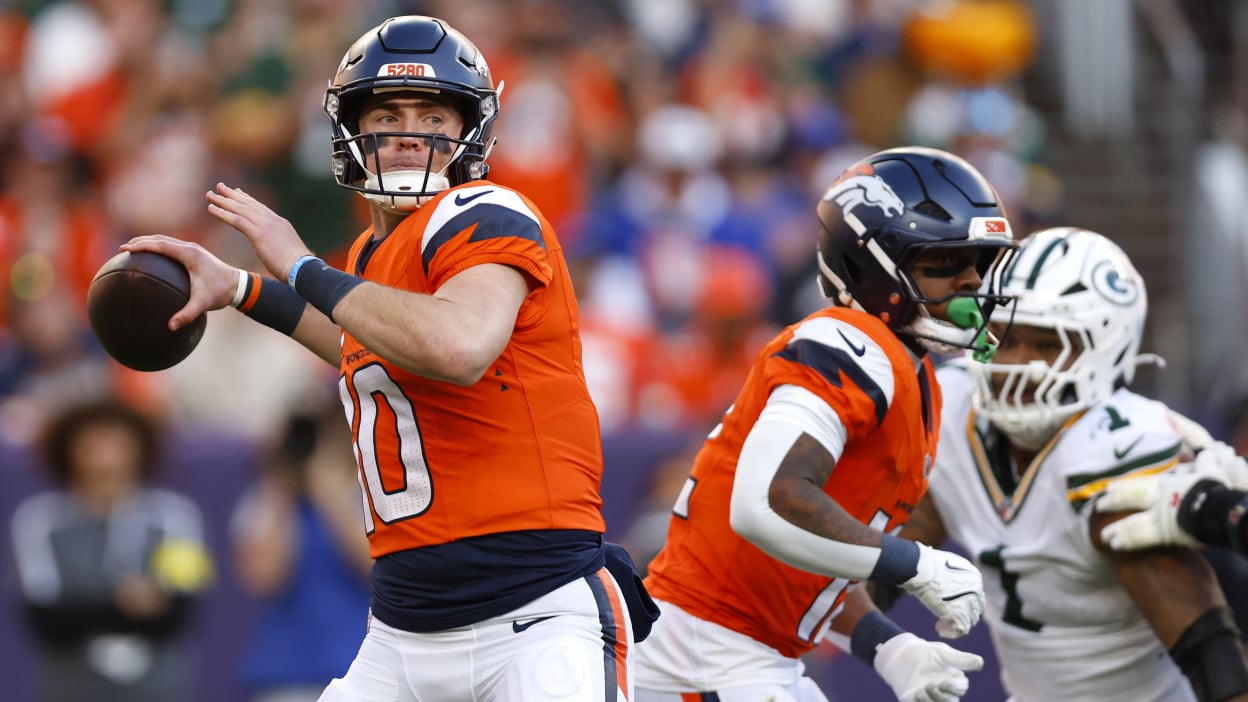 Bo Nix of the Denver Broncos throws a pass