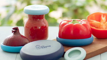 Assorted cut vegetables with silicone food lids