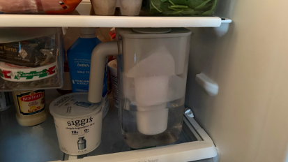 Culligan water pitcher on fridge shelf