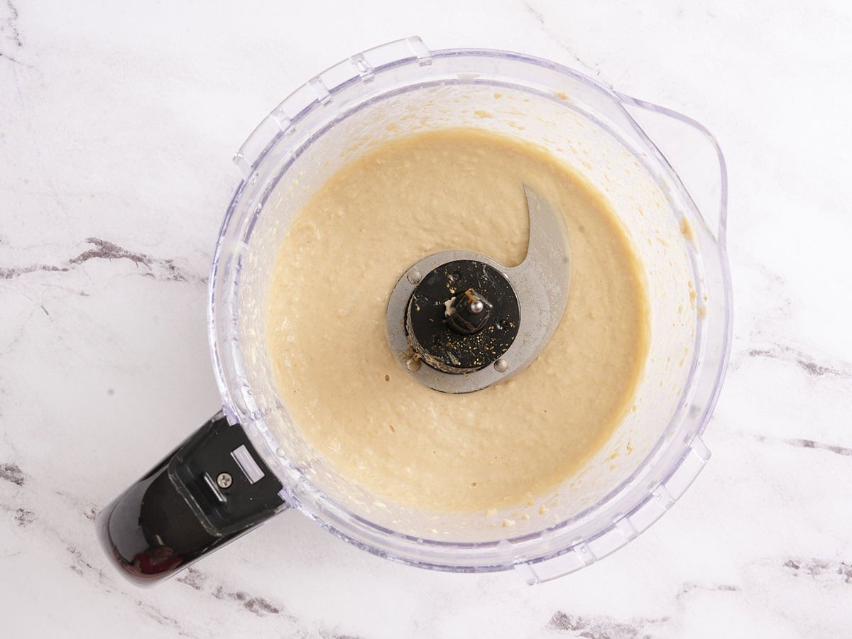 Hummus in a food processor.