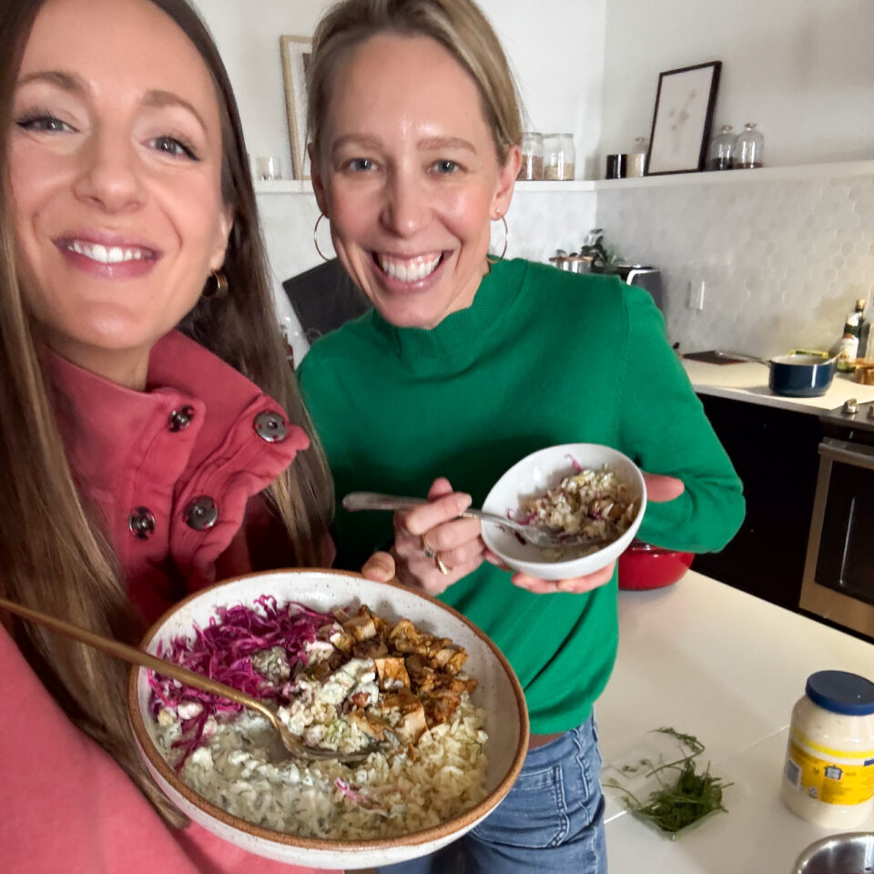 Lindsay and Amanda with chicken shawarma bowls.