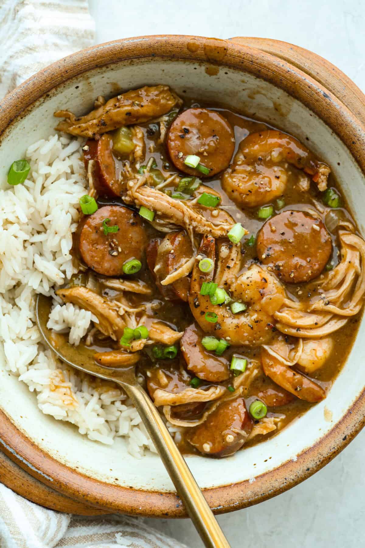 Bowl of a serving of New Orleans gumbo with rice.