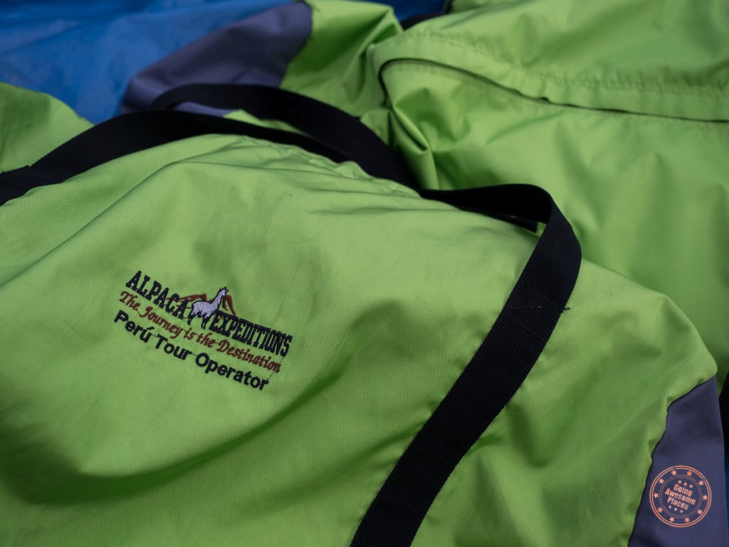 alpaca expeditions green duffles for inca trail that porters use