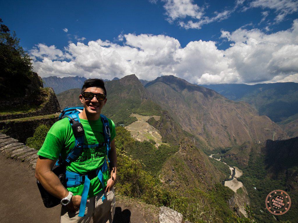 the view from near the top of huayna picchu looking down on machu picchu as part of alpaca expeditions hike