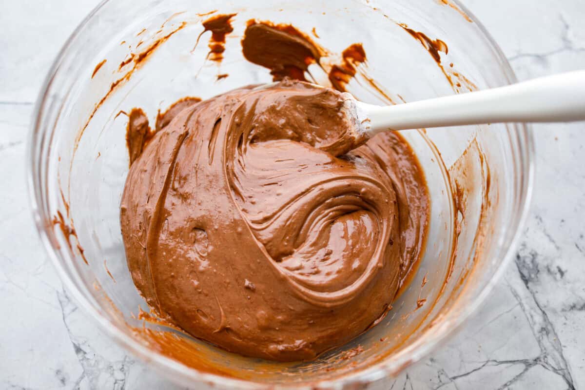 Whipped topping added to the melted chocolate.