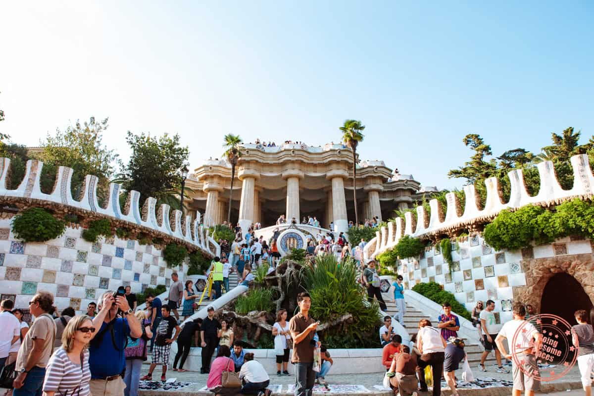 parc guell main staricase with tourists in barcelona