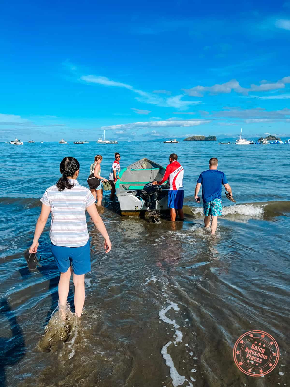 small boat to diving vessel with rocket frog divers