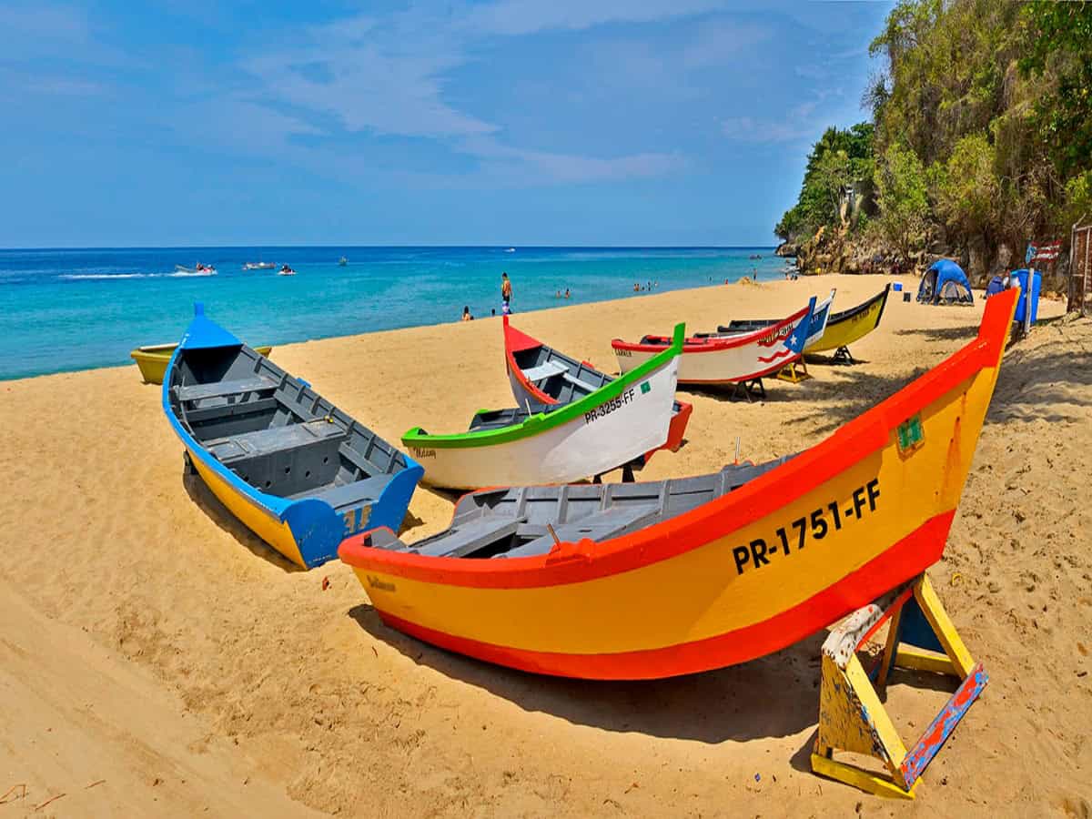 colorful boats on beach in puerto rico