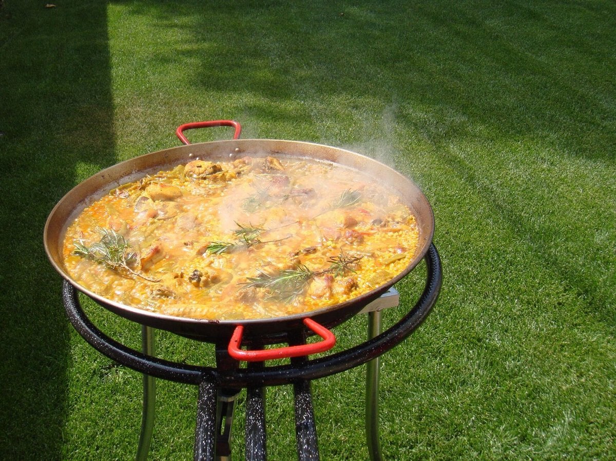valencia with kids - What Slowing Down in Valencia Actually Looks Like With Kids Paella in Valencia, Spain.