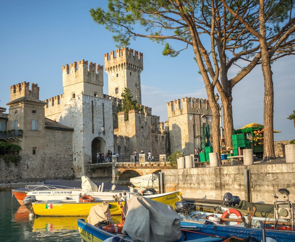 - Three Shores, One Lake: Finding Your Own Rhythm on Lake Garda Scaliger castle at Lake Garda, Italy.