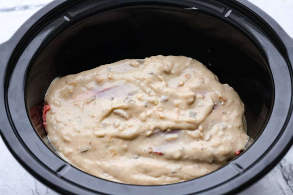 Gravy add to the top of the chuck roast in the crockpot, ready to cook.