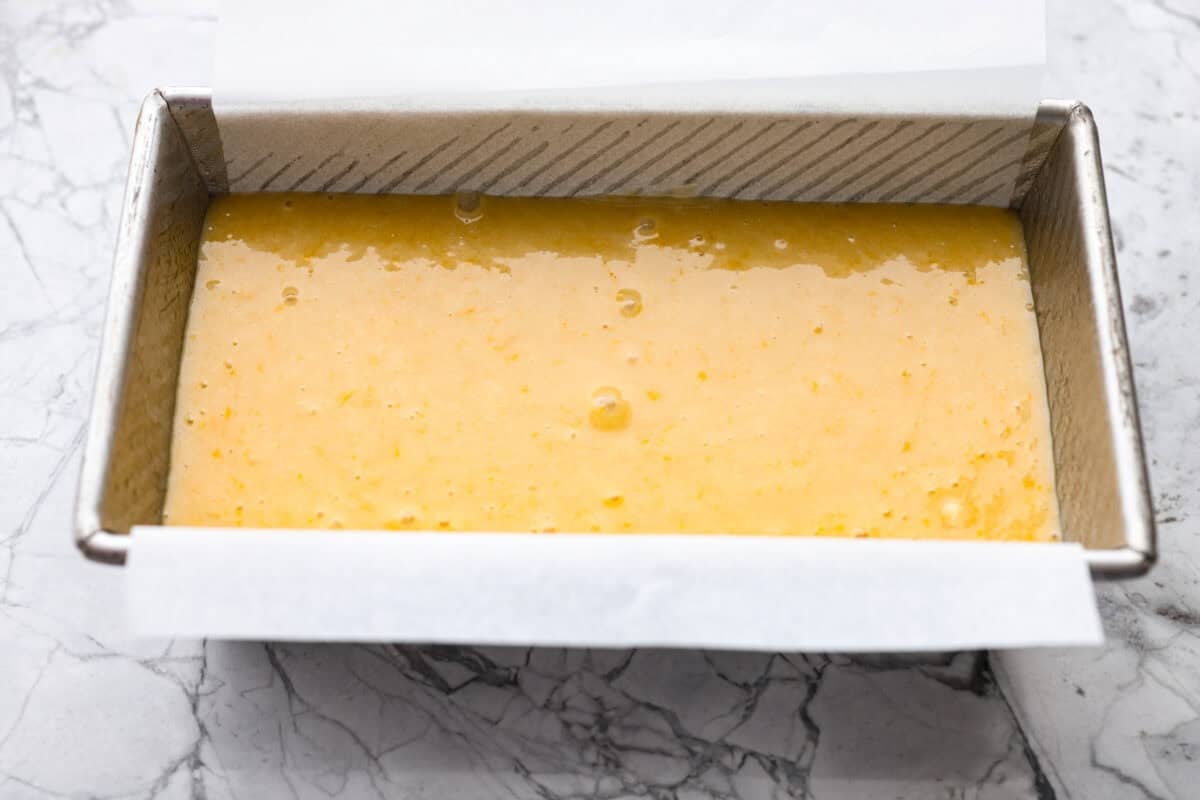 Batter in a loaf pan.
