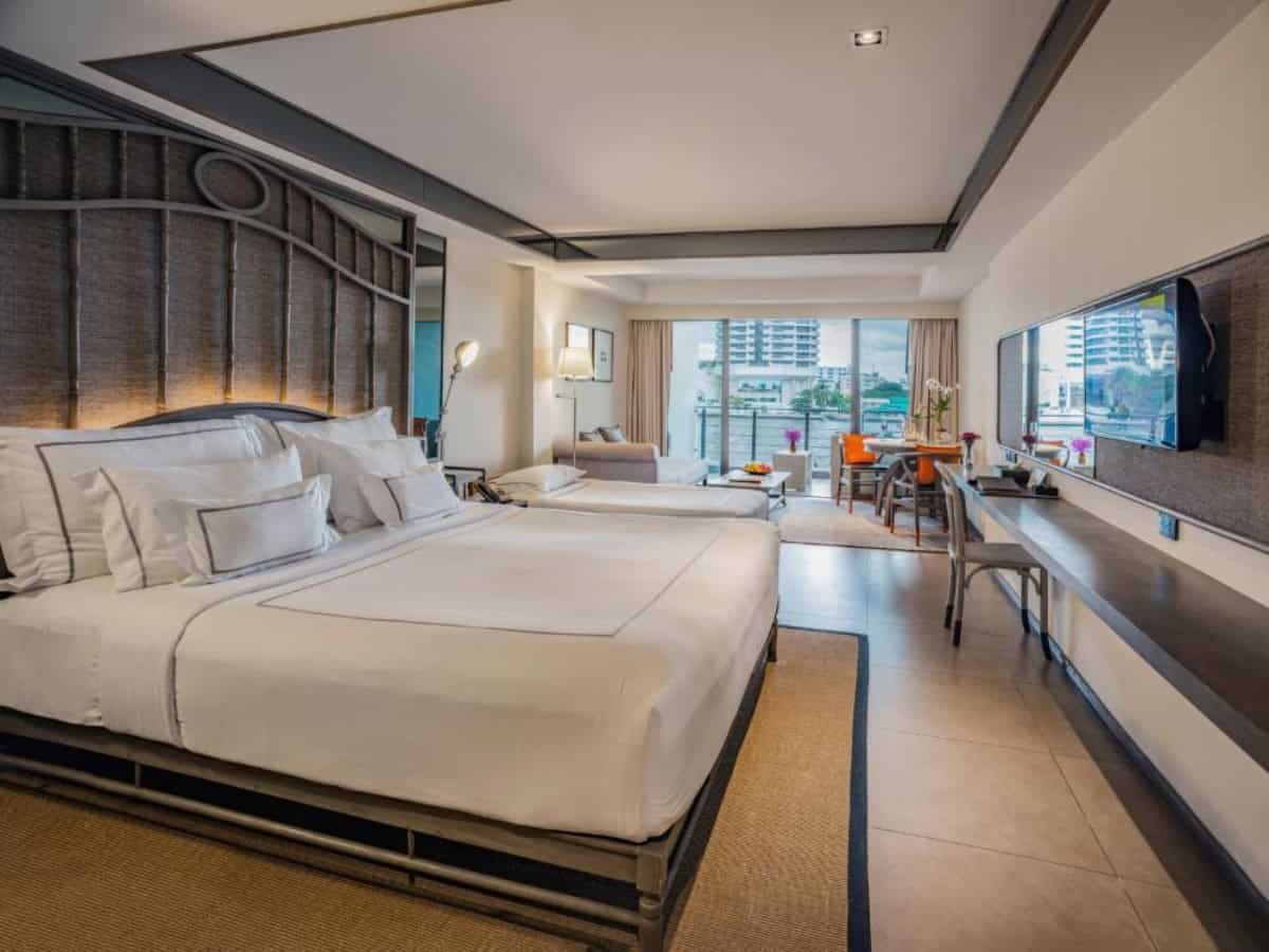 large room with a view at riva surya bangkok