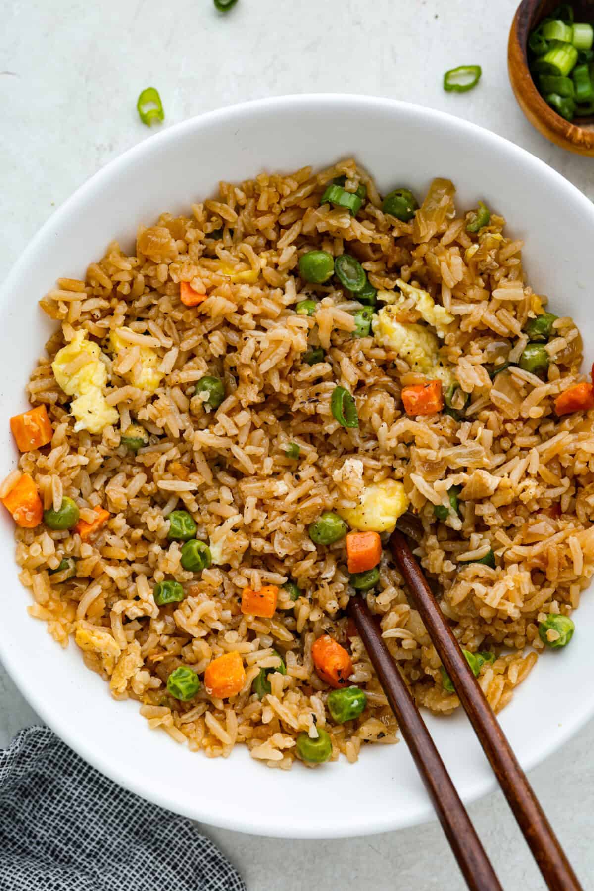 Bowl of easy fried rice with chopsticks.