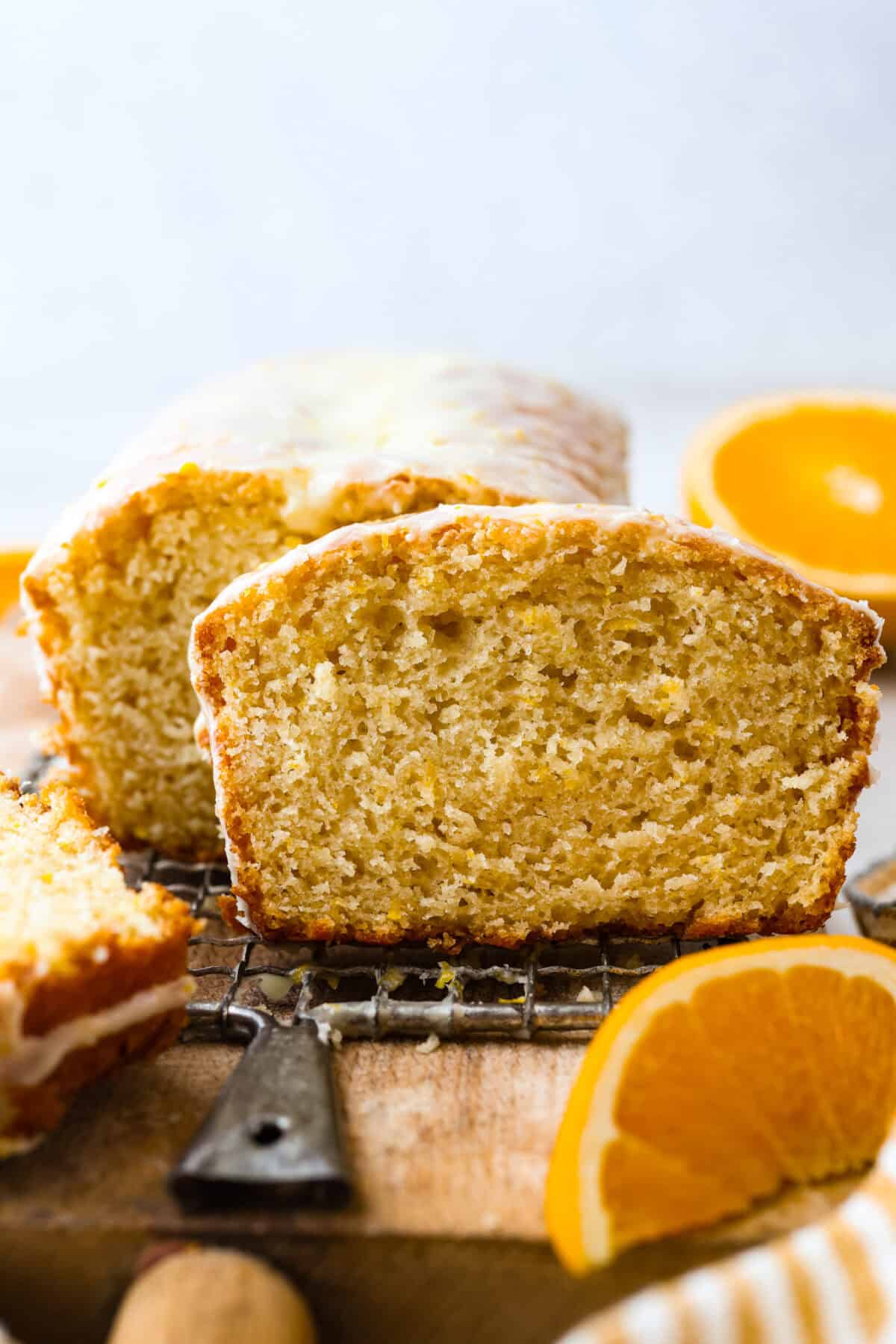 Side shot of my glazed orange loaf sliced.