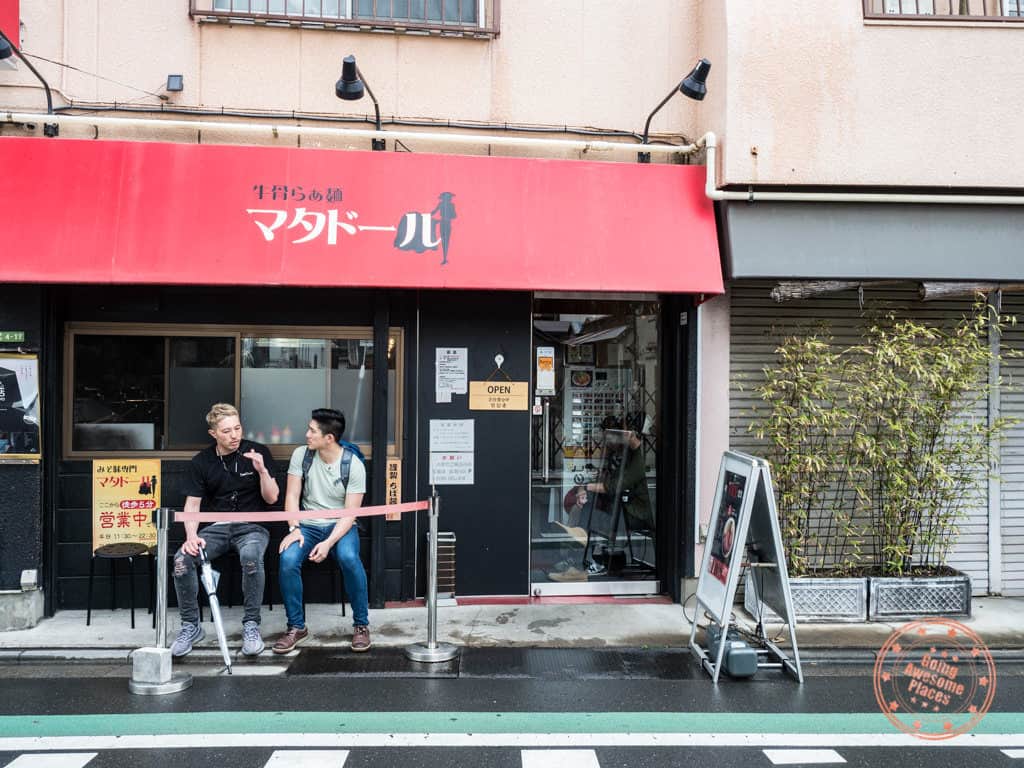 hiroshi and will in front of matador ramen shop