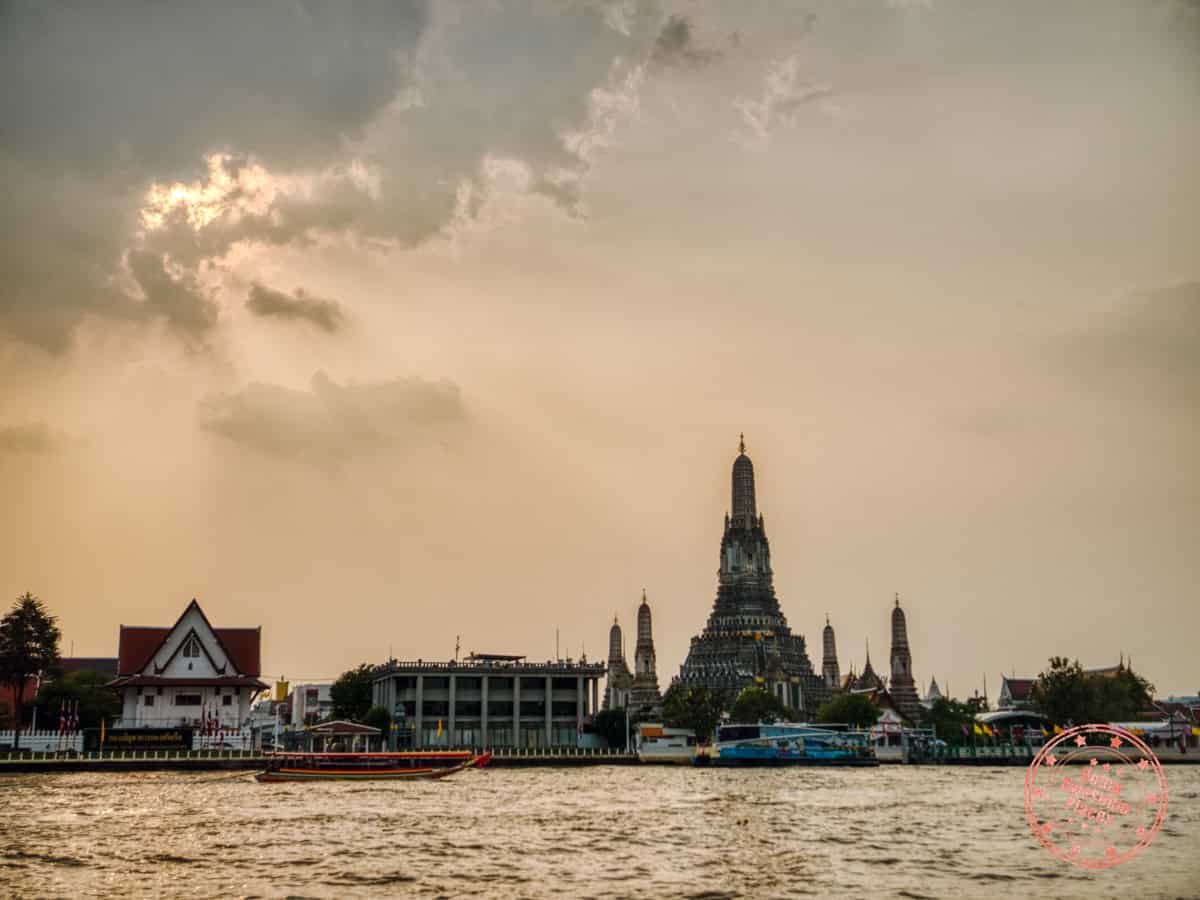 wat arun sunset view from across the river
