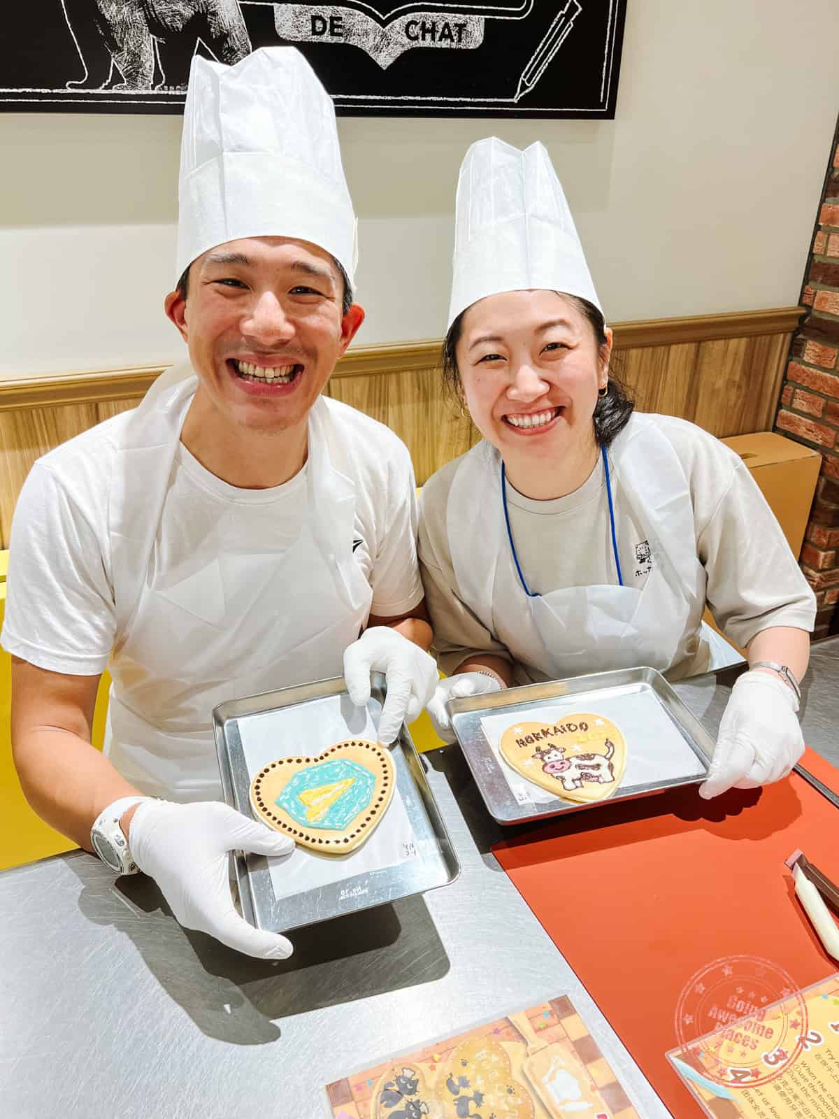 will and chantelle at cookie making course at shiroi koibito park