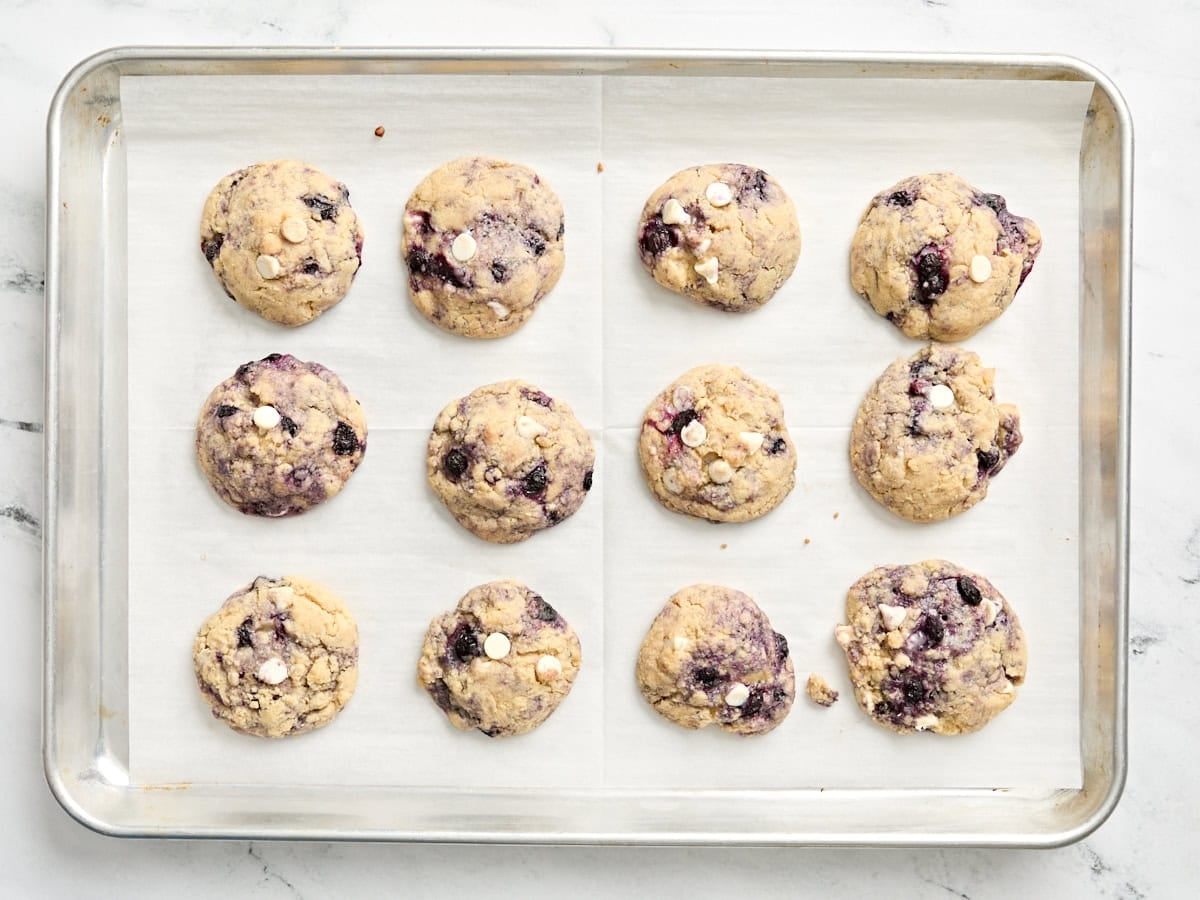 Blueberry cookies on a baking sheet.