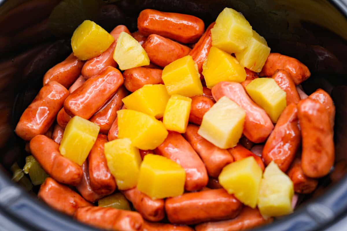 Pineapple and lit'l smokies in a slow cooker.