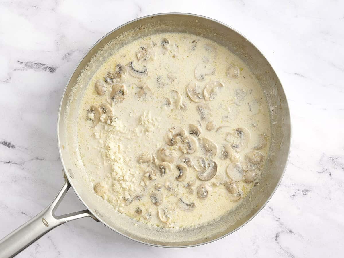 Parmesan cheese added to a creamy mushroom pan sauce.