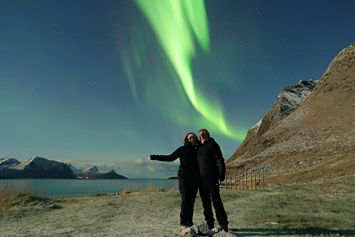 northern norway trip - A Guide to Exploring the Outdoors of Northern Norway Two people under the northern lights in Lofoten
