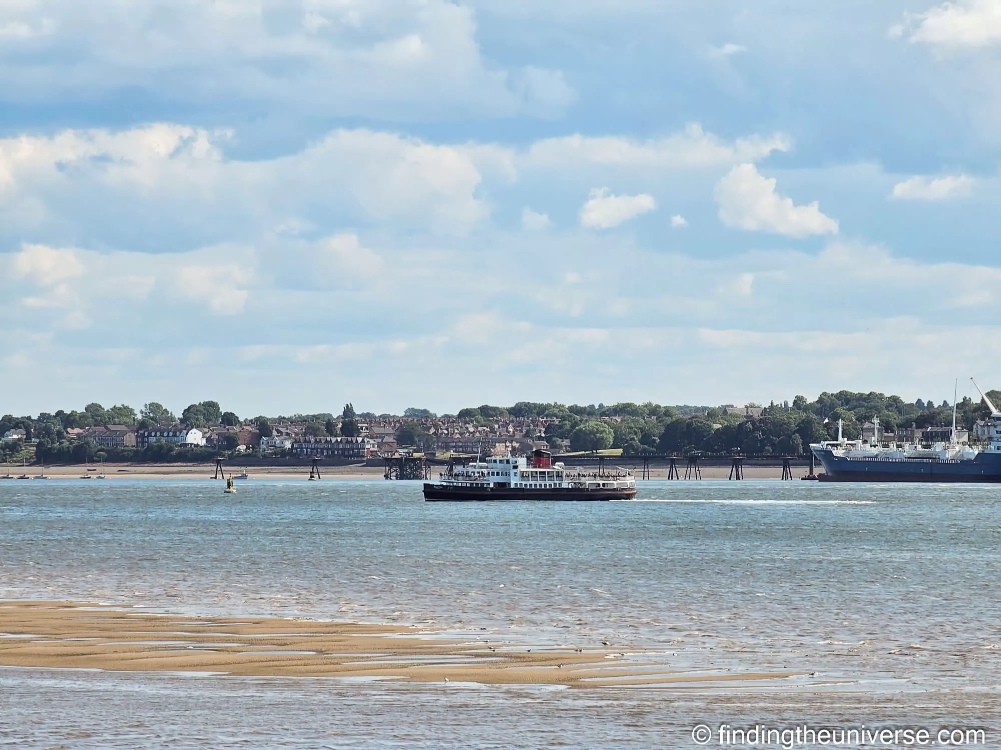 A Mersey Ferry crossing the River Mersey at Liverpool