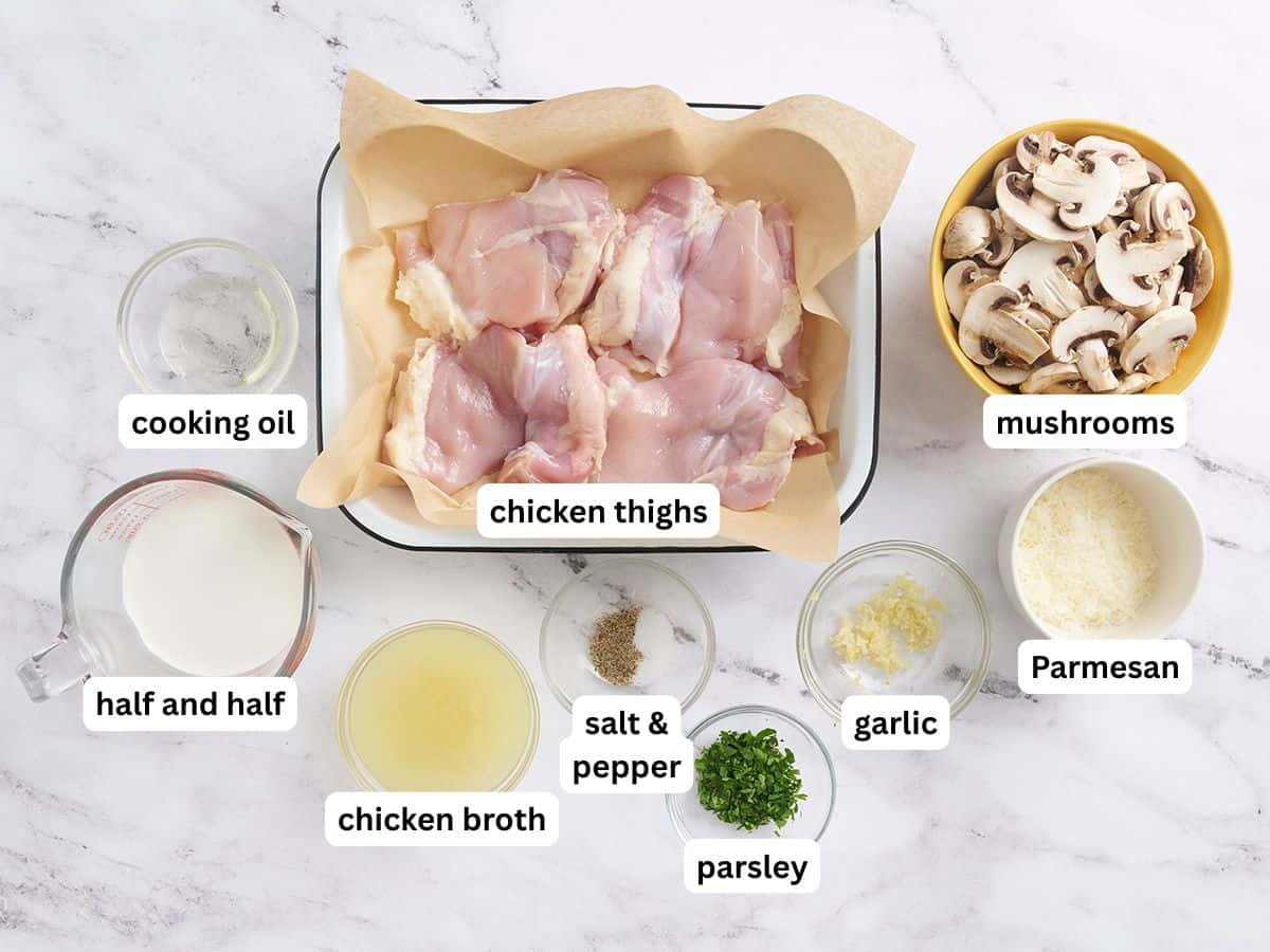 The ingredients to make creamy mushroom chicken with labels.
