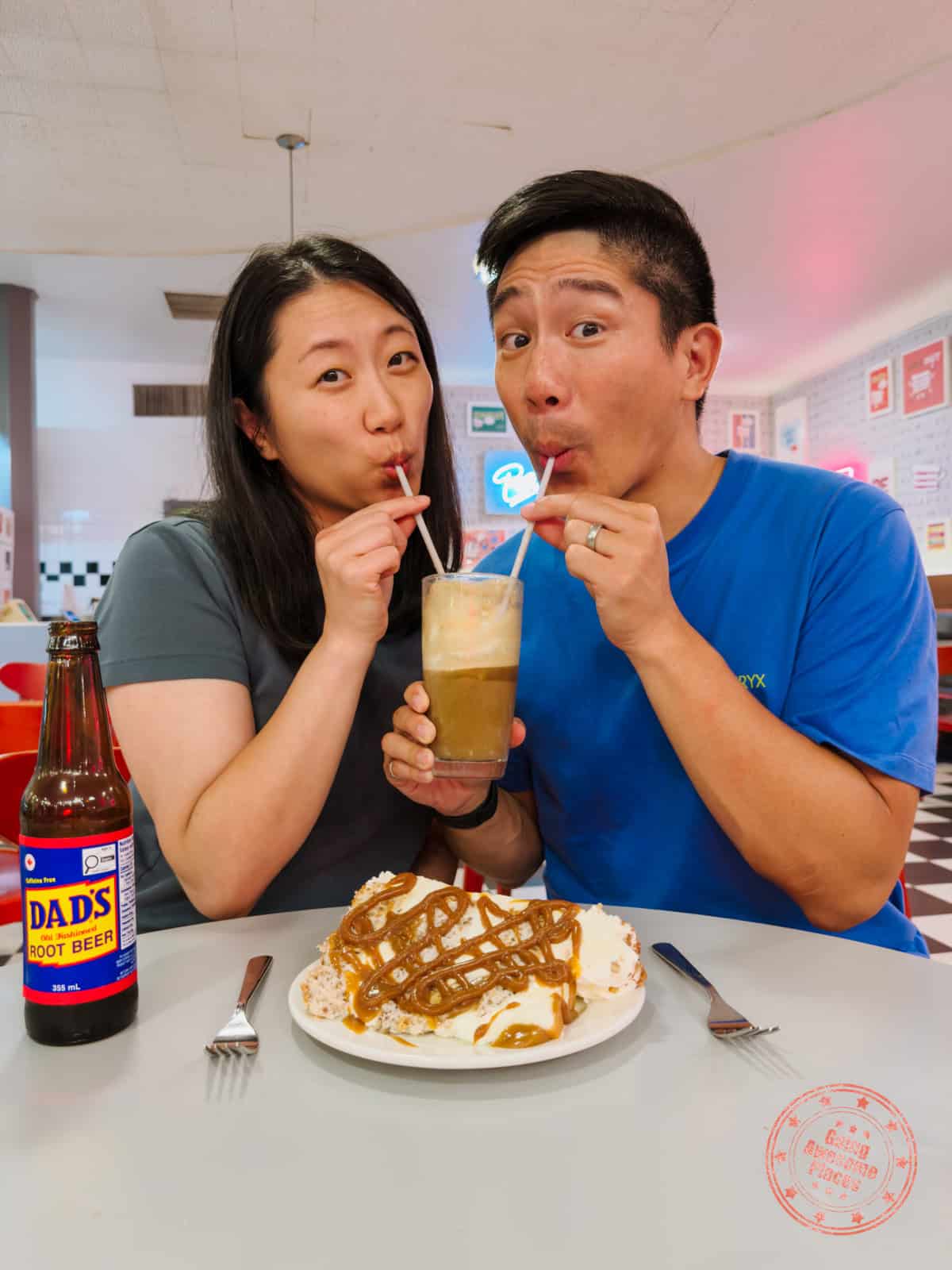will and chantelle sharing a root beer float and schnoo cake at baked expectation in winnipeg