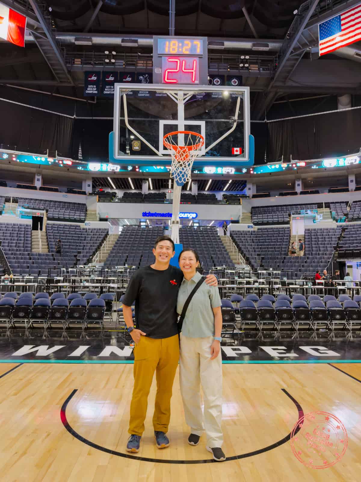 asian couple on court after cebl winnipeg sea bears game
