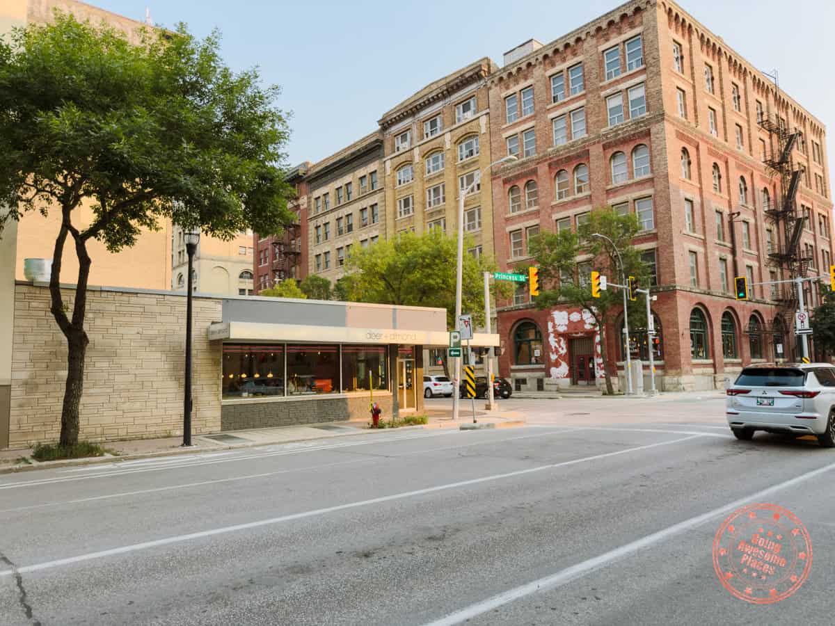 deer + almond restaurant storefront in downtown winnipeg
