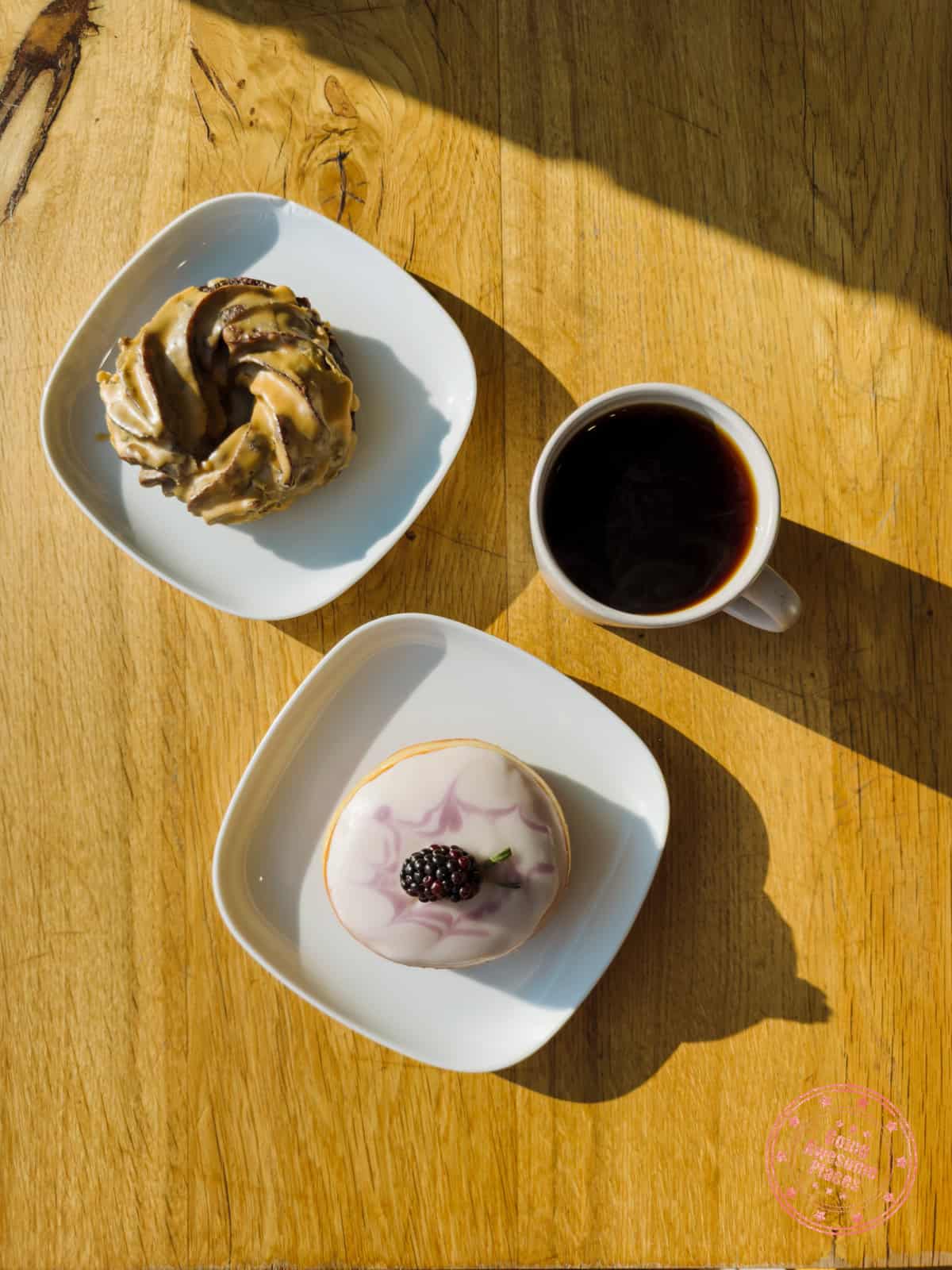 oh doughnuts in winnipeg with espresso crueller, blackberry lavender cheesecake doughnut and coffee